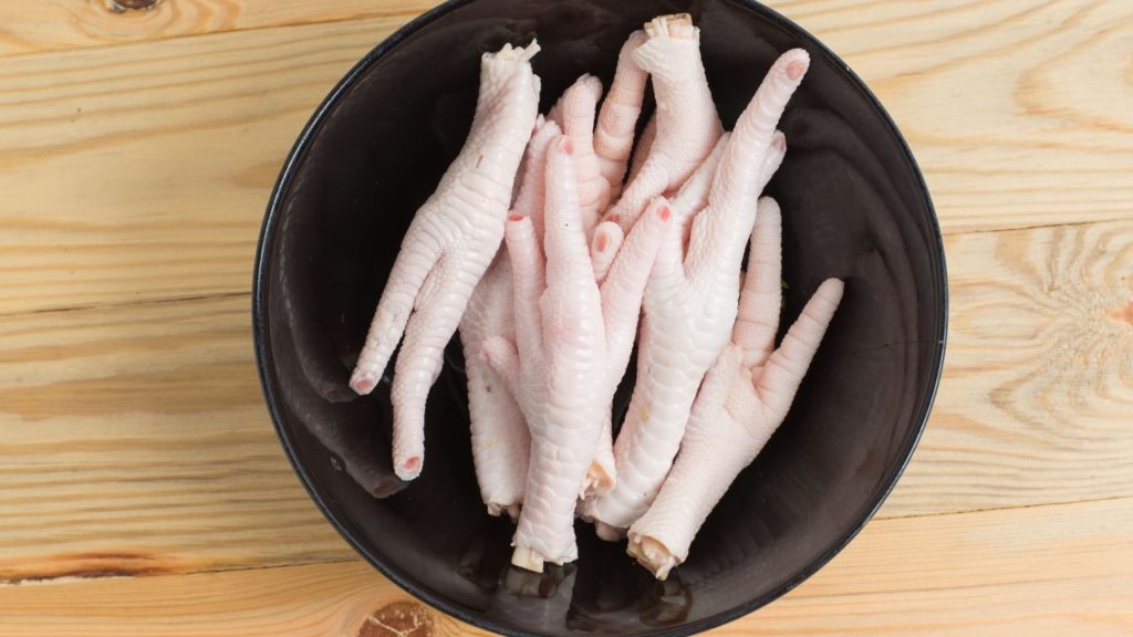 A bowl full of chicken feet